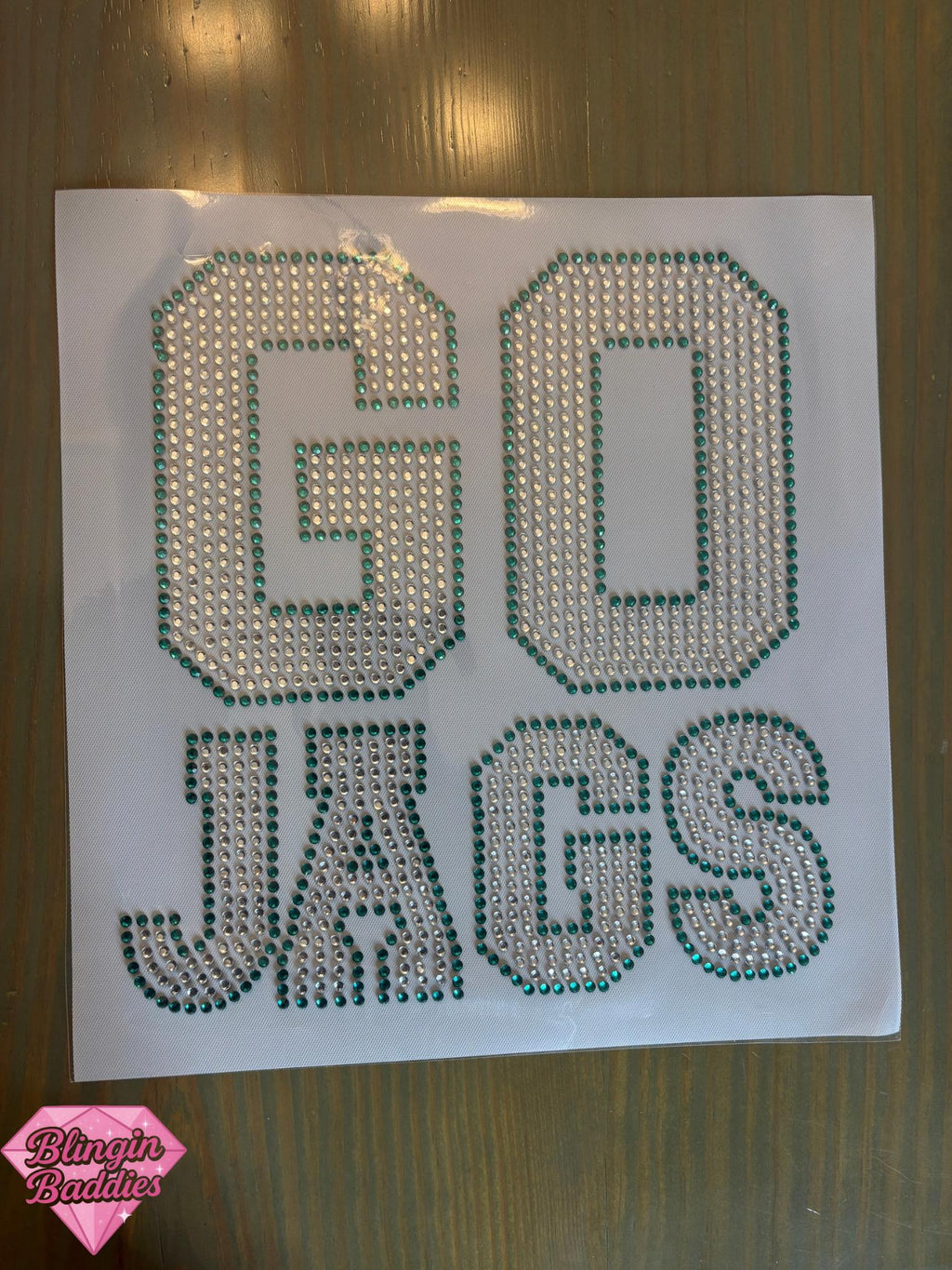 GO JAGS rhinestone heat transfer in teal and crystal block letters, Jacksonville Jaguars gameday bling